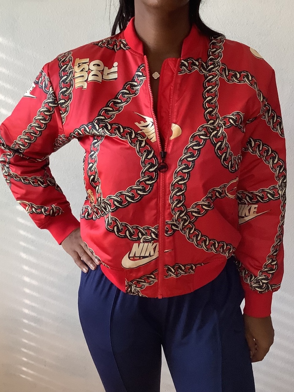NWT Nike Jacket Women’s X-Small Red Gold Chain Print Just Do It Swoosh Bomber